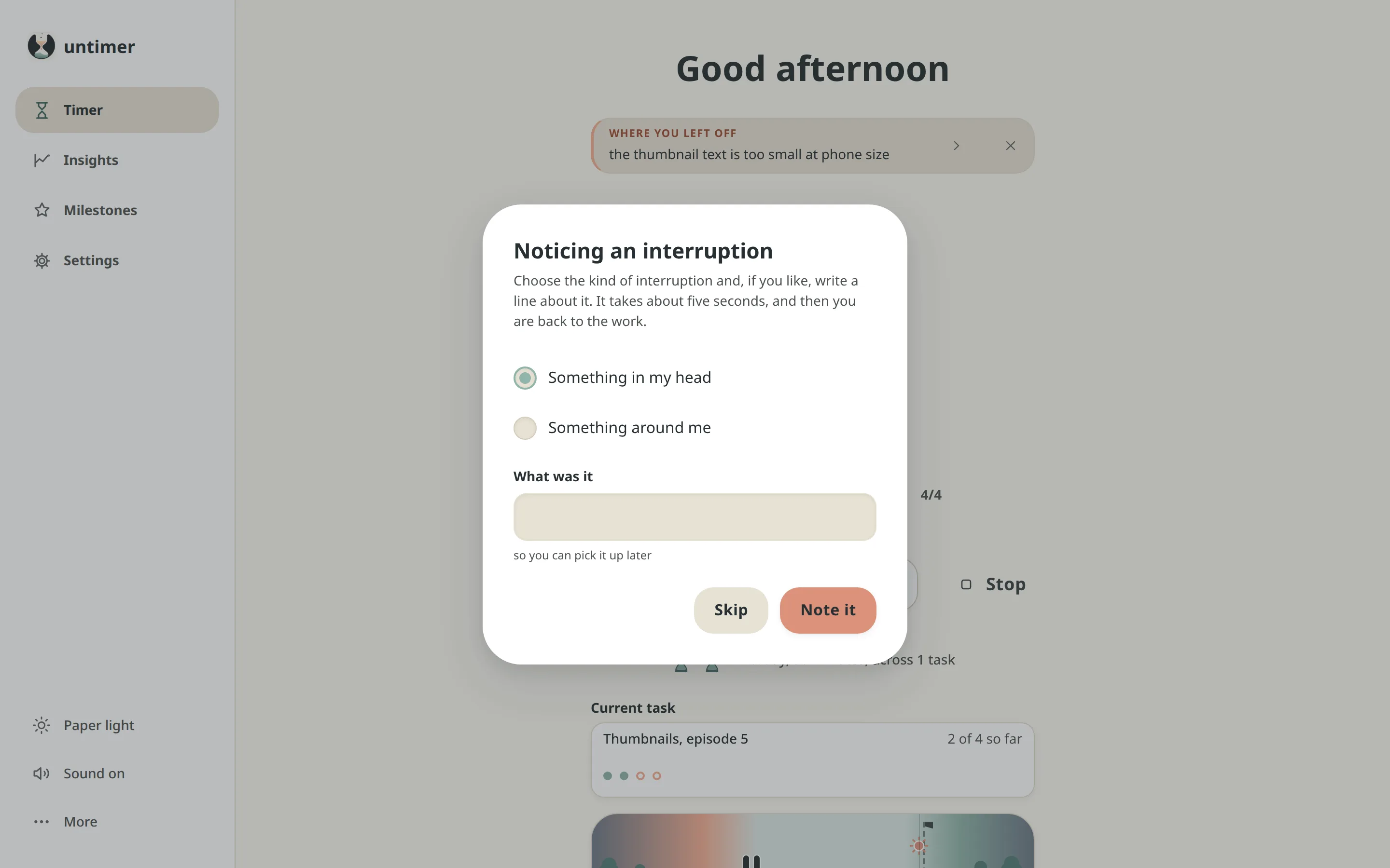 The interruption sheet over a running session: Noticing an interruption, optional, five seconds, then back to it; two choices, Something in my head and Something around me; a field labelled What was it, so you can pick it up later; and two buttons, Skip and Note it.